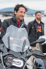 SALZBURG, AUSTRIA - JUNE 01: EpicRider Adrien Brody poses during the arrival of the Life Ball plane on June 1, 2018 in Salzburg, Austria. The EpicRiders travel from Zurich to Vienna as part of the Life Ball 2018 raising money for amfAR's life-saving research to find a cure for HIV/AIDS. (Photo by Lennart Preiss/Getty Images)