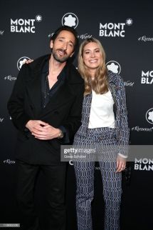 BERLIN, GERMANY - APRIL 24: Adrien Brody and Stephanie Radl, Head of Communications of Montblanc attend the "To Berlin and Beyond with Montblanc: Reconnect To The World" launch event at Metropol Theater on April 24, 2019 in Berlin, Germany. (Photo by Gisela Schober/Getty Images for Montblanc)
